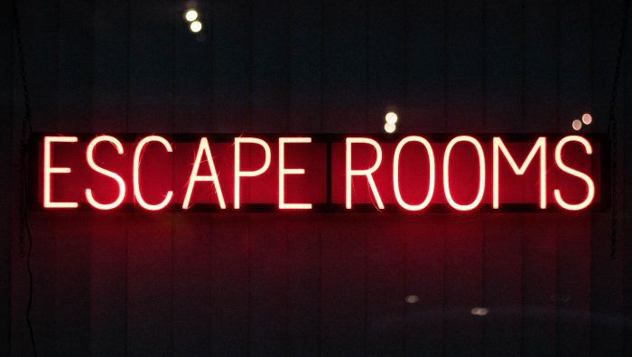 red escape rooms neon sign